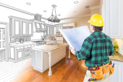 Male Contractor with Hard Hat and Plans Looking At Custom Kitchen Drawing Photo Combination On White.